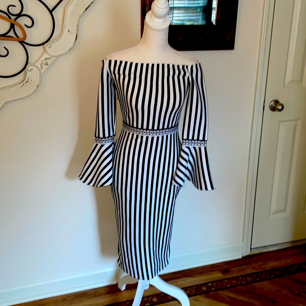 Black and white spandex dress. Shows curves